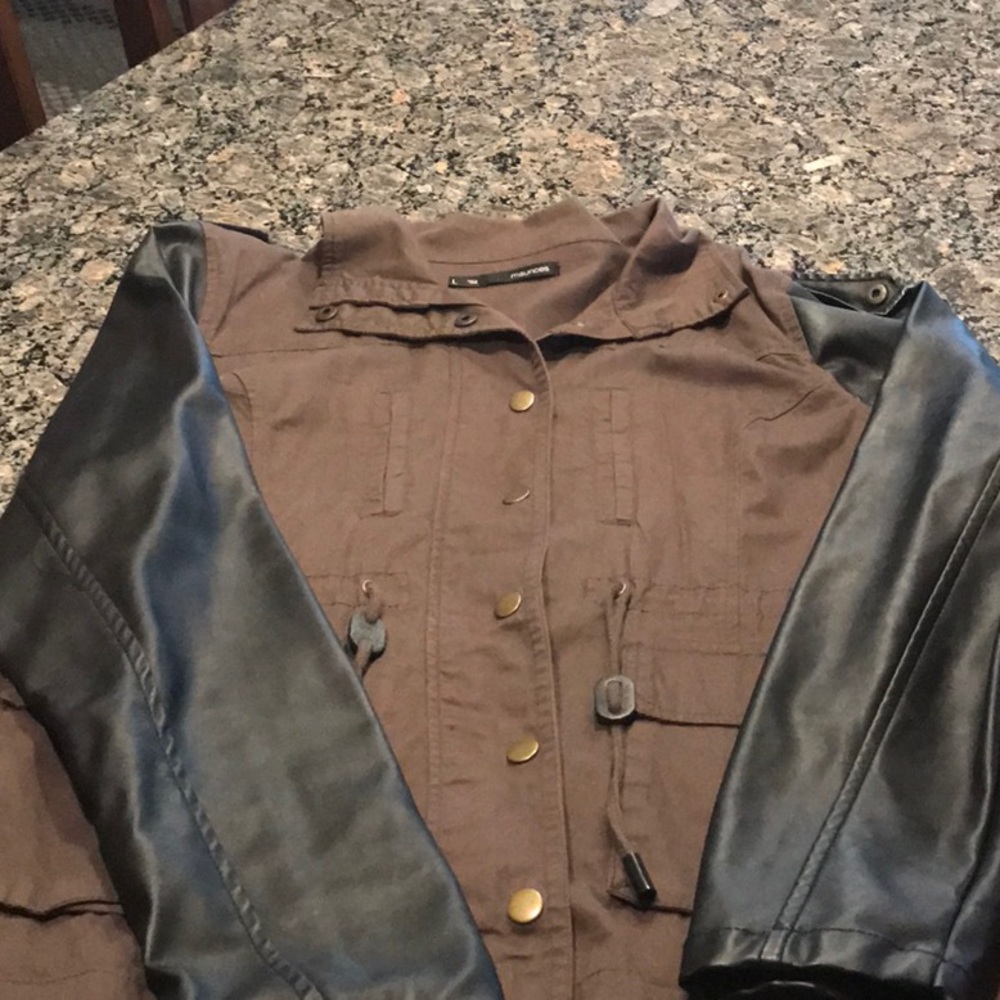 utility brown jacket with black leather sleeves
